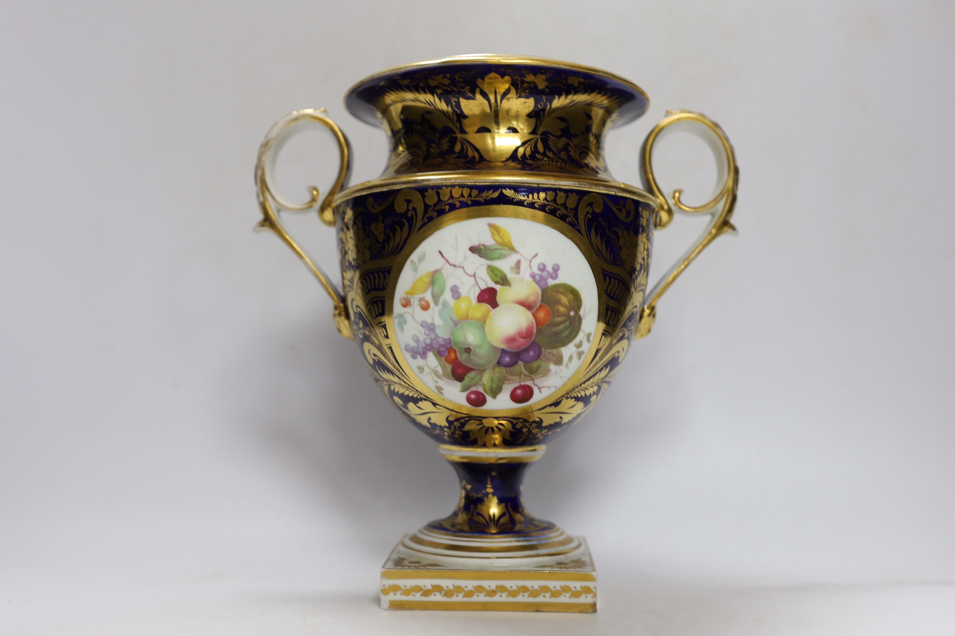 A garniture of three early 19th century Derby vases painted with fruit, tallest 23cm